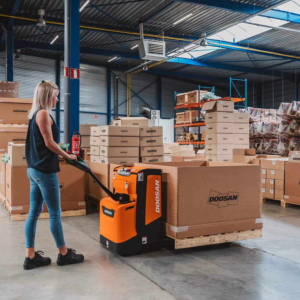Operator with Doosan 1.8 – 5 Tonne Powered Pallet Truck